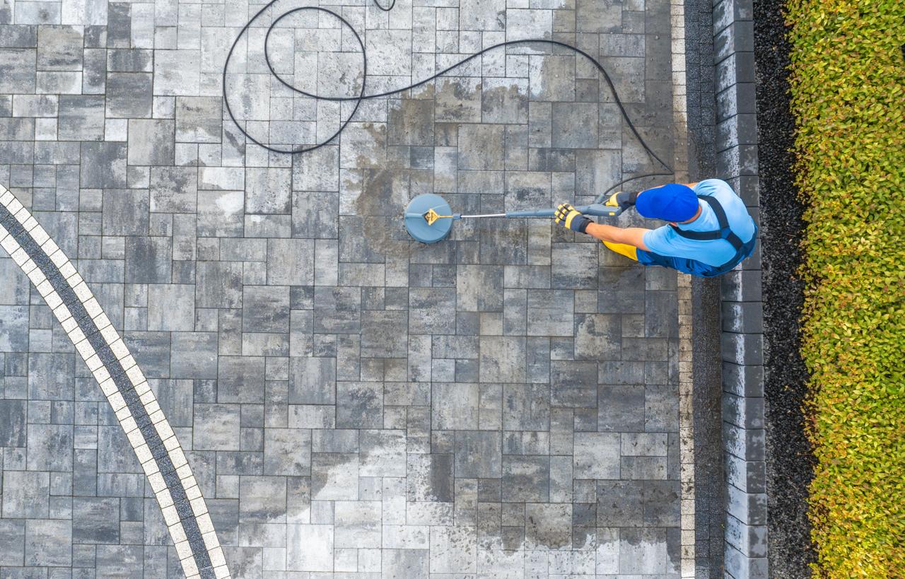 Aerial view of professional driveway pressure washing